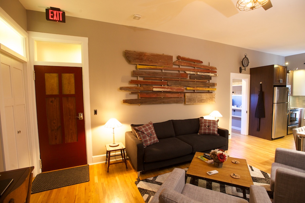 Welcome to Vetehuset - Plantera! The red door is the entry from the hall with the living area and kitchen area just steps away!