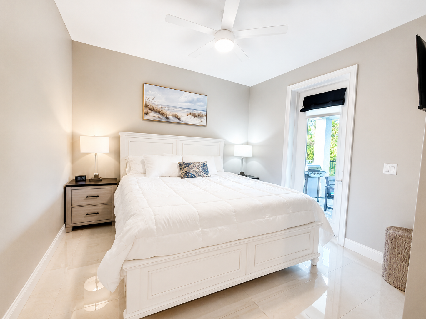 Bright, breezy, and just steps from the grill, this cheerful bedroom opens right onto the patio. Picture slippers on in the morning, coffee in hand, breakfast sizzling on the barbecue—the simple pleasures that make a family vacation feel like home.