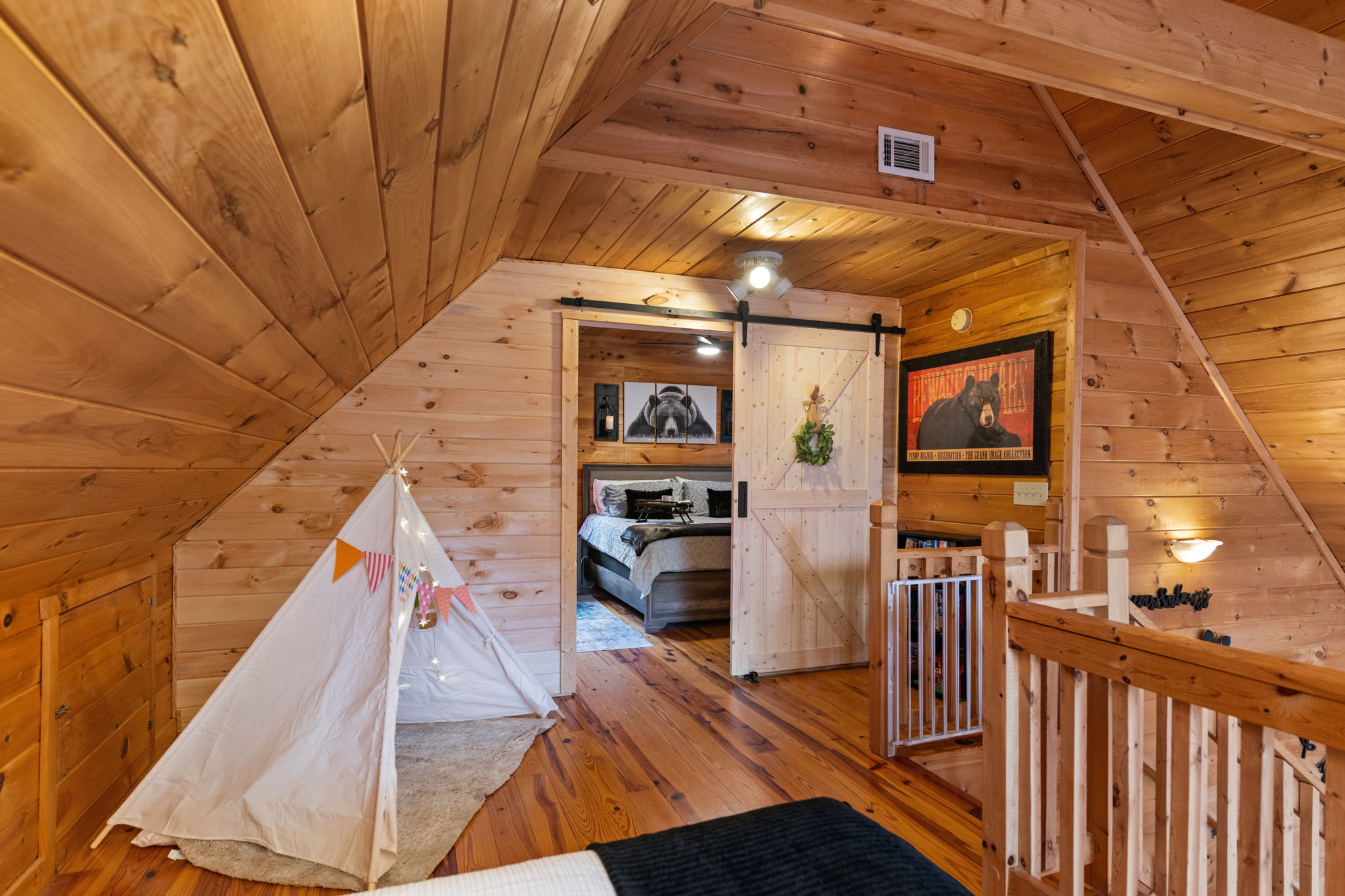 A cozy loft area located just before Bedroom 2 includes two twin-size beds, perfect for additional sleeping space.