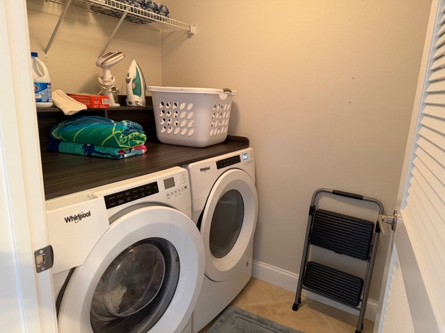 Washer and dryer conveniently located in condo