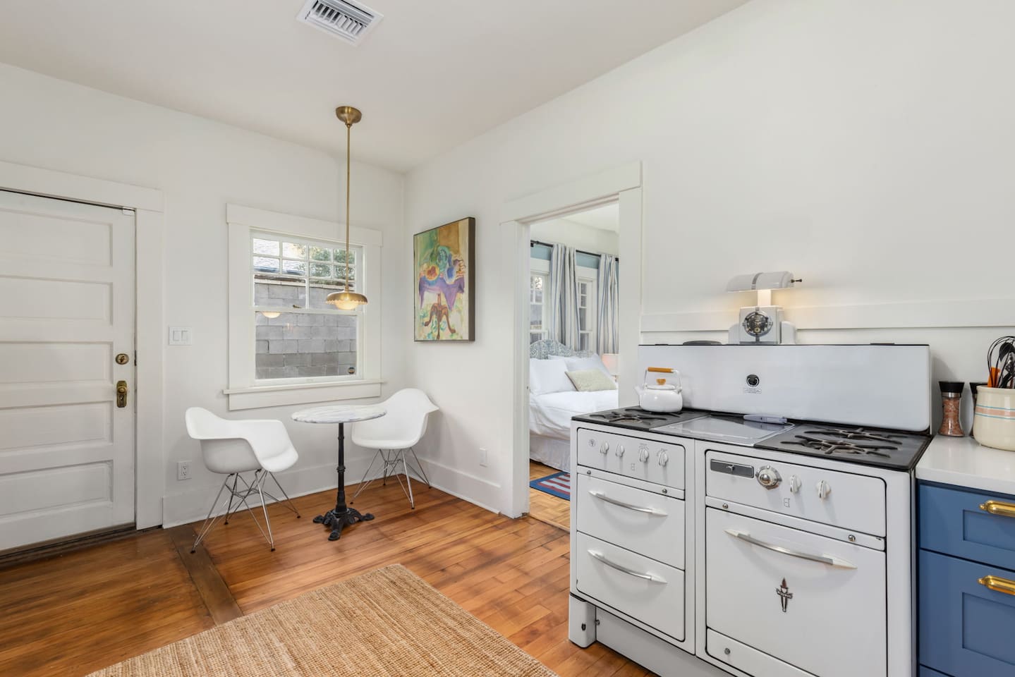 kitchen with new cabinets, wood floors and vintage Wedgewood stove