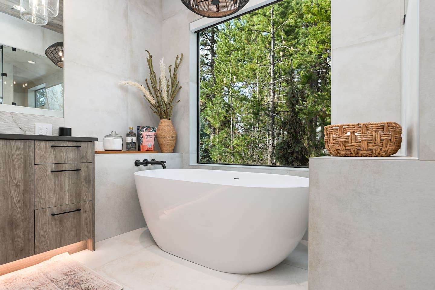 Relax in the bathtub while soaking in serene nature views