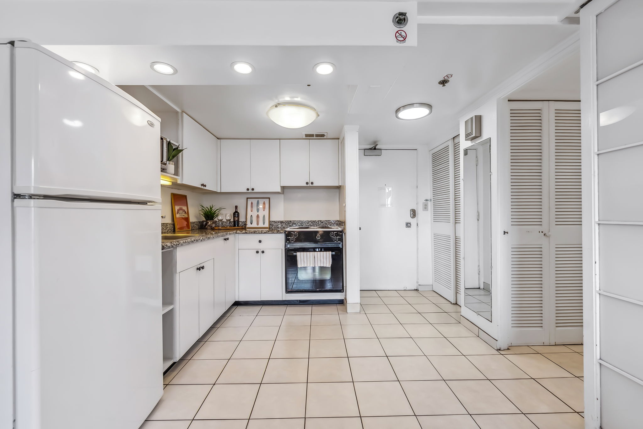 Kitchen is fully equipped with essentials for home cooking.  Full size refrigerator, stove/oven, microwave for guest convenience
