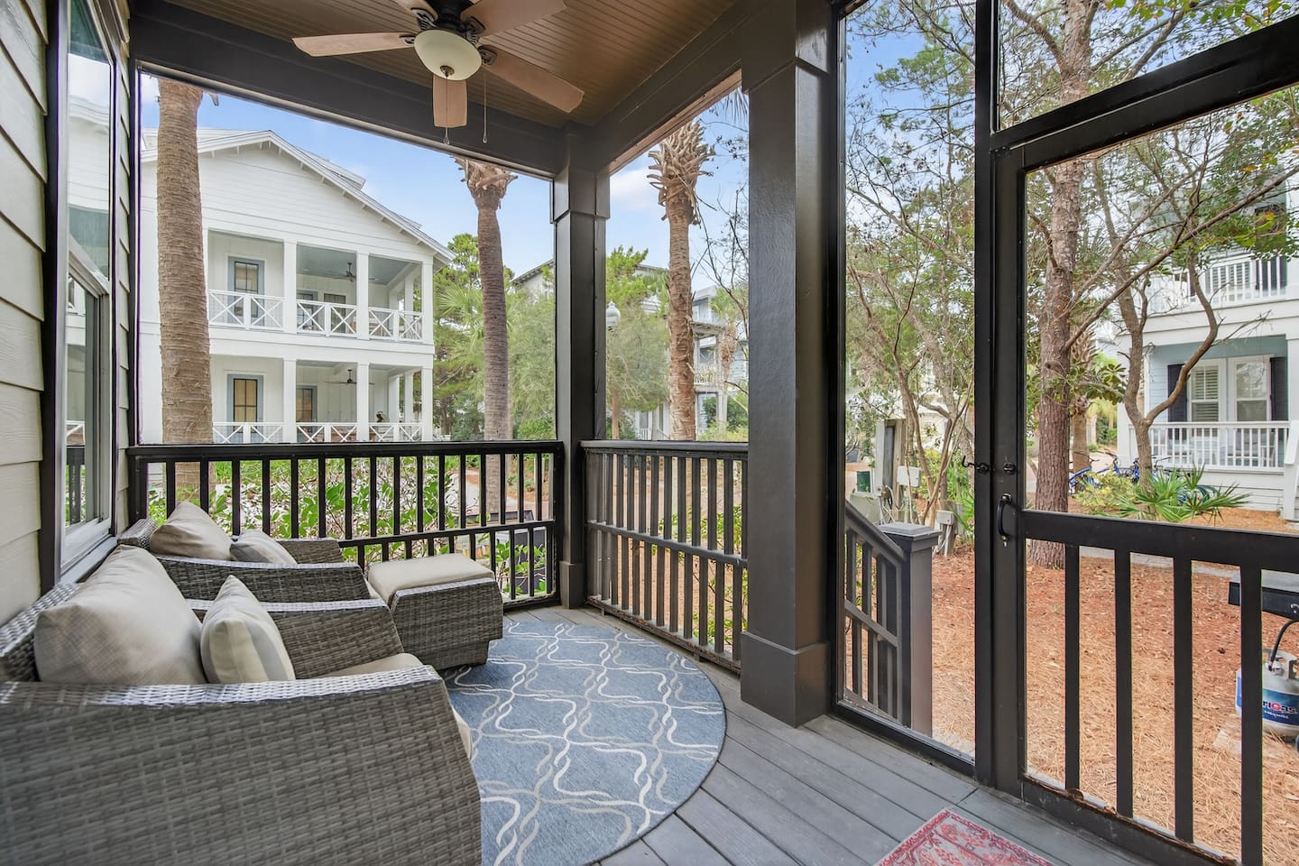 First floor screened-in porch lounging area