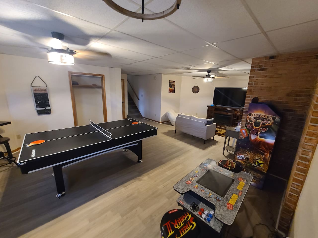 Game Room: Unwind with ping pong and vintage arcade fun in this spacious entertainment hub!