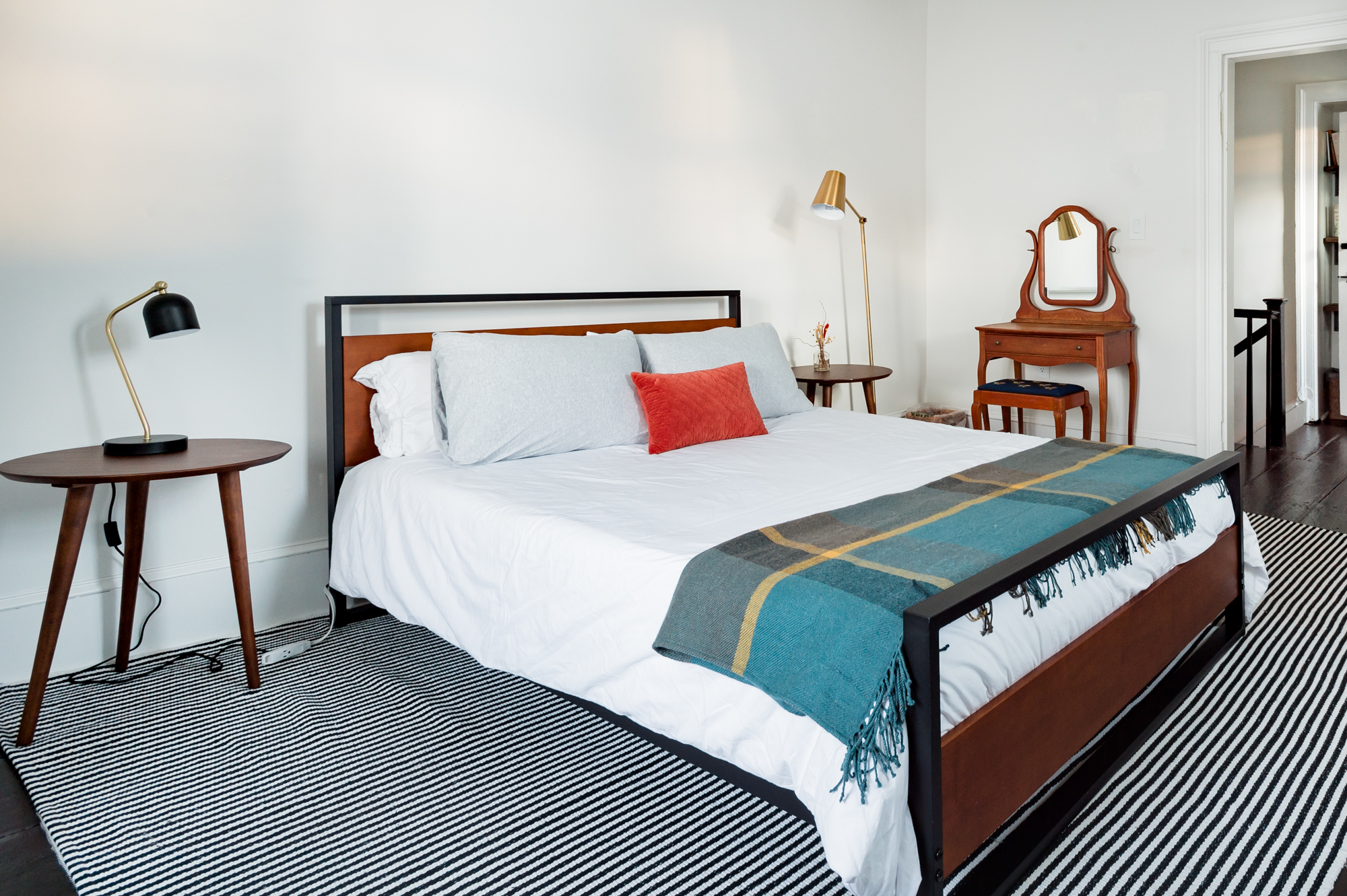 The queen bed in Bedroom 2