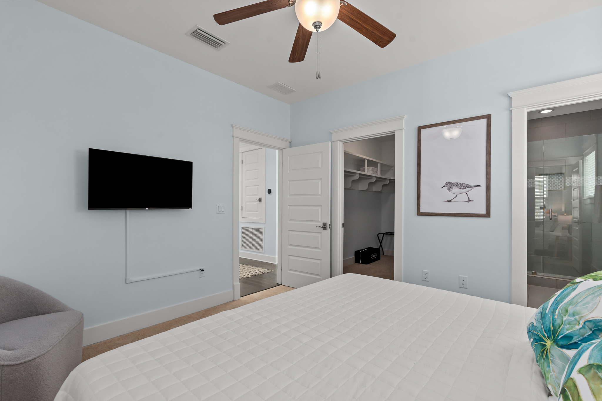 This secondary upstairs master bedroom has a king size bed and ensuite bathroom.