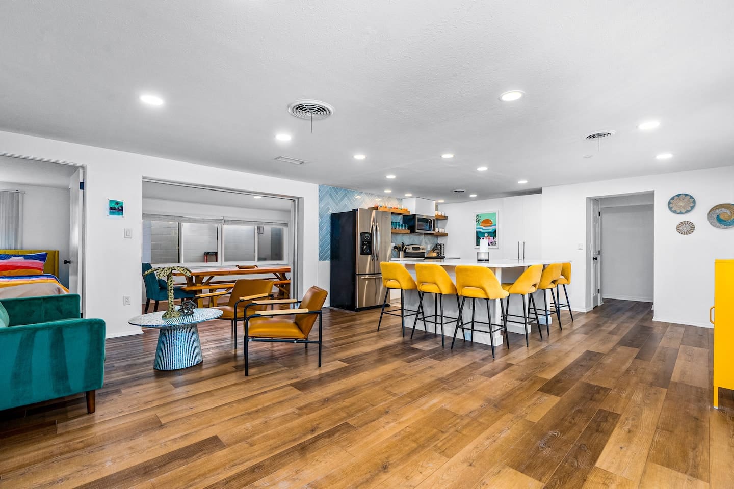 Newly remodeled kitchen with full slab quartz countertop, seating for 8. 