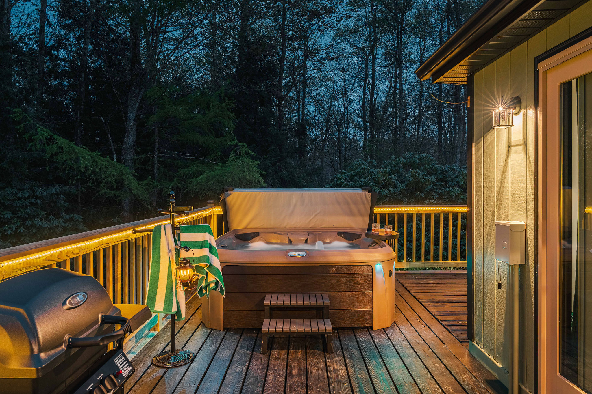 🔥 Propane grill and hot tub side by side — dinner and a soak.