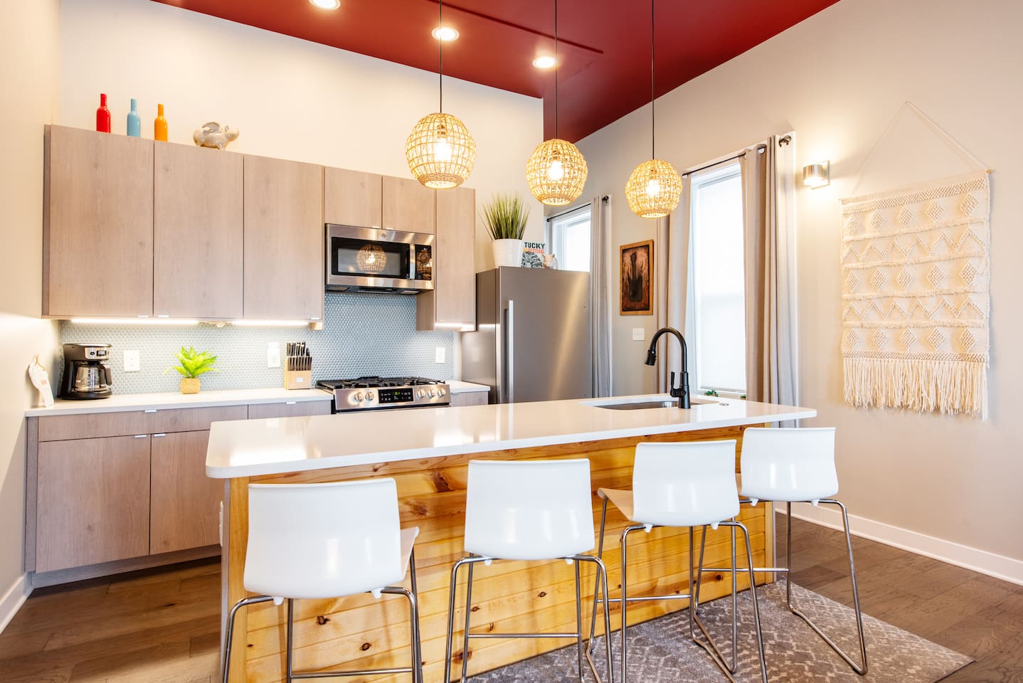 Fully stocked kitchen with dishwasher, refridgerator, gas oven/range, & microwave.