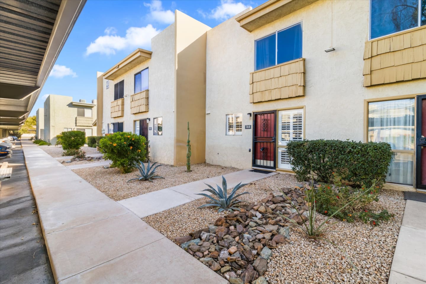 Exterior View with desert landscaping and easy front-door access.
