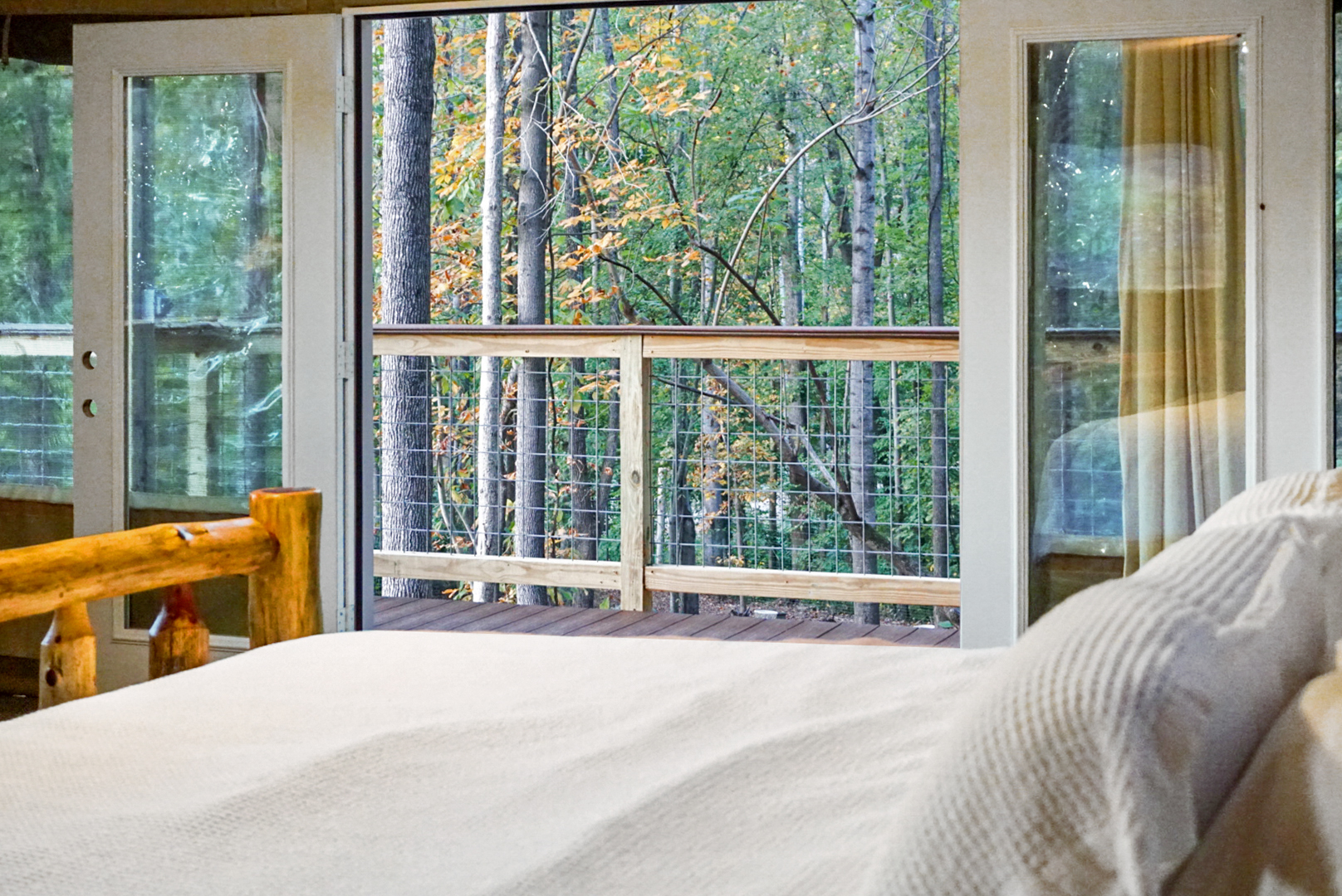 Wake up to breathtaking forest views and fresh air from your private deck!