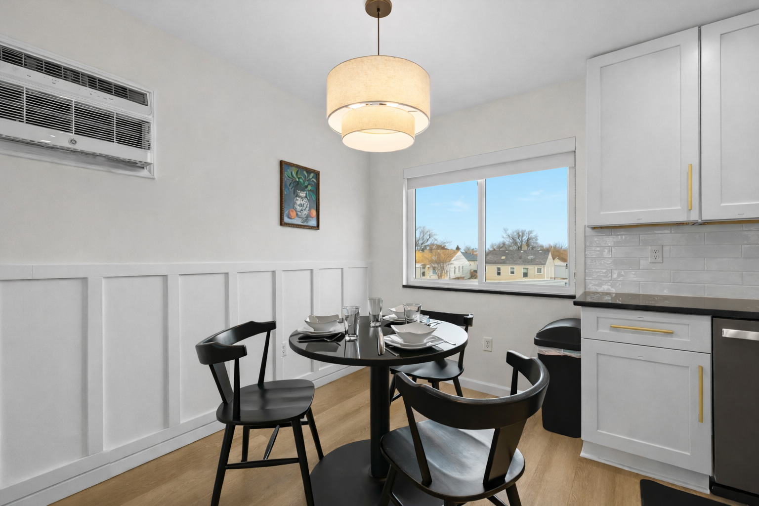 Enjoy meals in this bright, modern dining nook with stylish seating, warm lighting, and a cozy setup perfect for everyday dining.