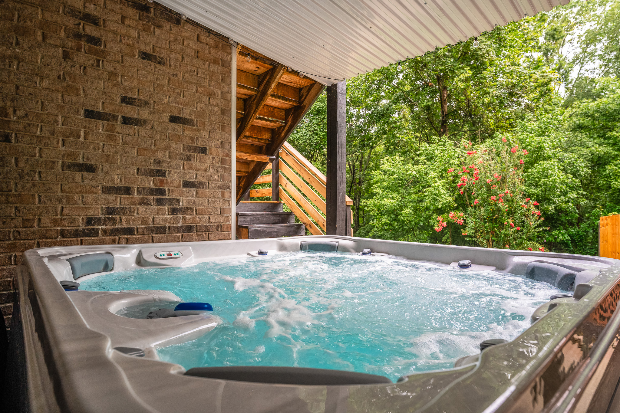 Hot tub Heaven: 7 person Luxurious Hot Tub Grab your drink, hit that jet button, and let seven people melt into the bubbly bliss. Stargazing encouraged. Relaxation required.