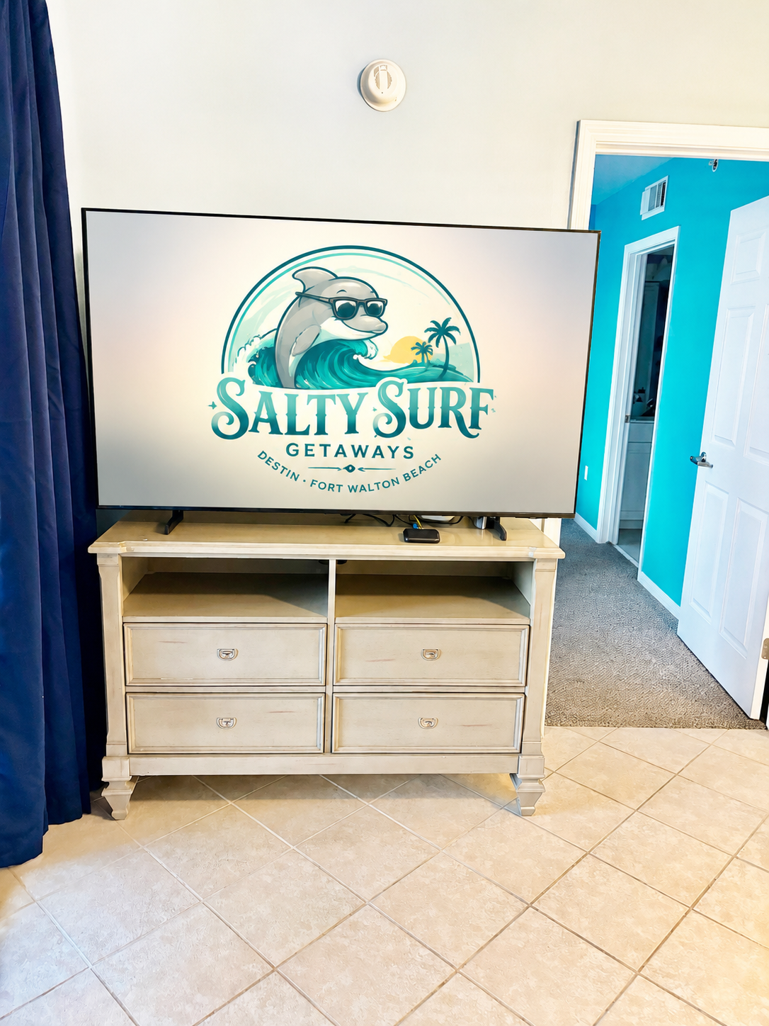 The living room TV is a 65” Samsung smart tv