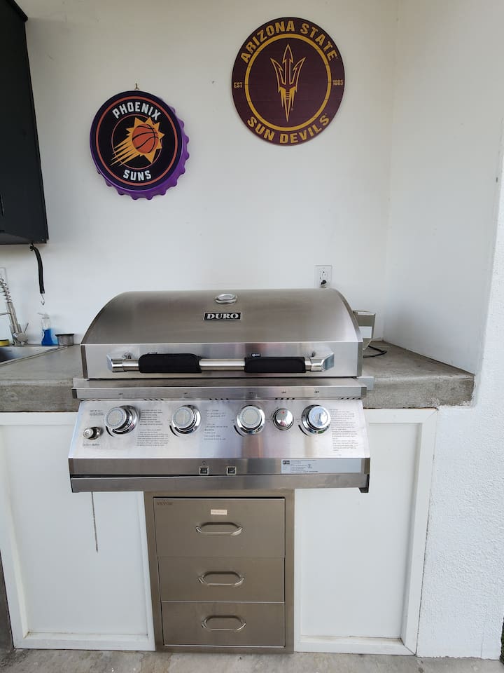 Professional natural gas grill for convenient, ready-to-use outdoor cooking.