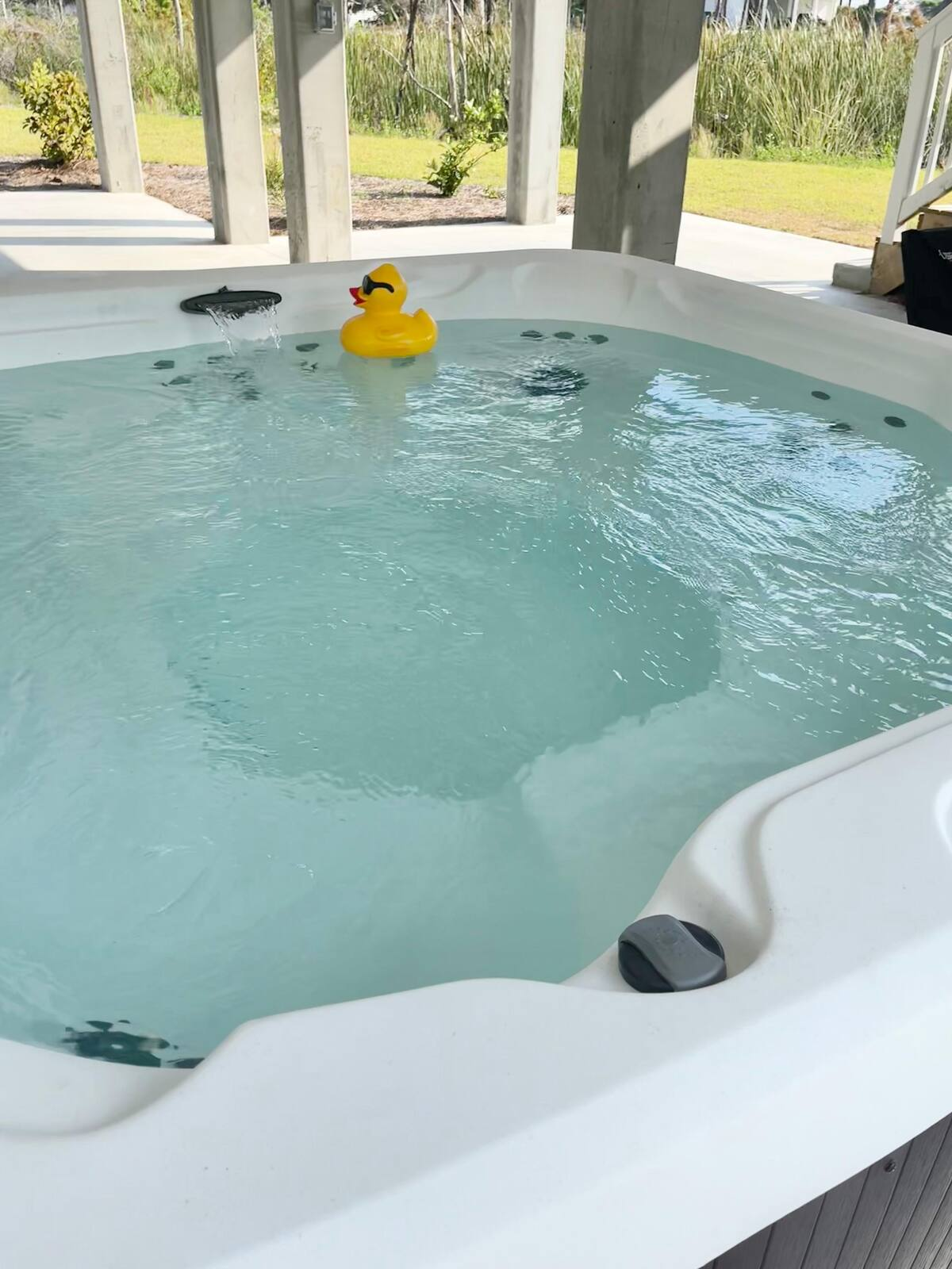 Unwind in the brand-new hot tub for your perfect coastal getaway.