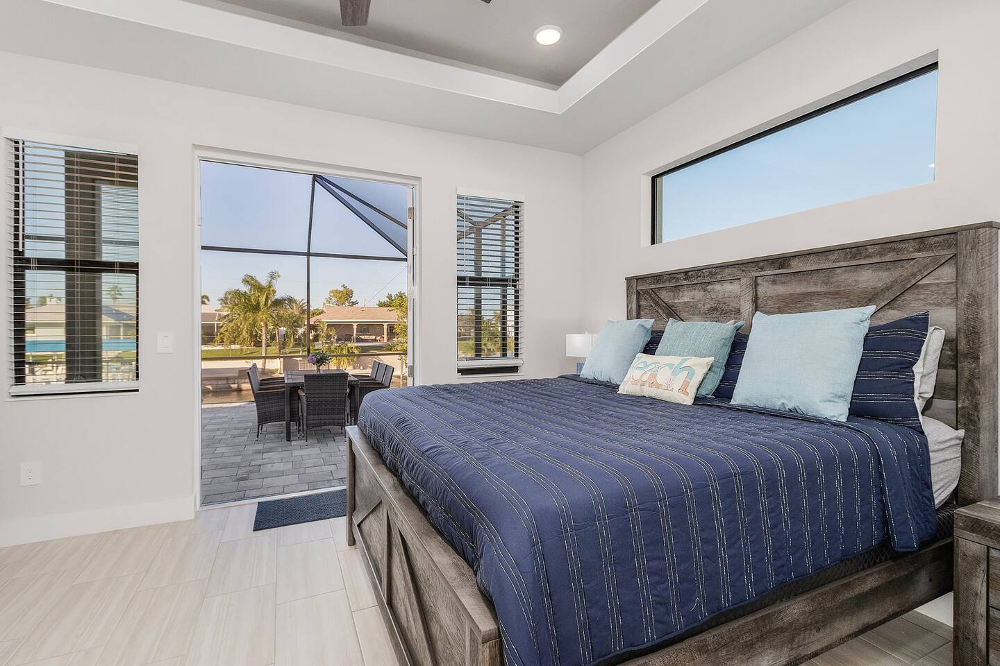 2nd Primary suite (King- size) with access to the lanai and pool area.