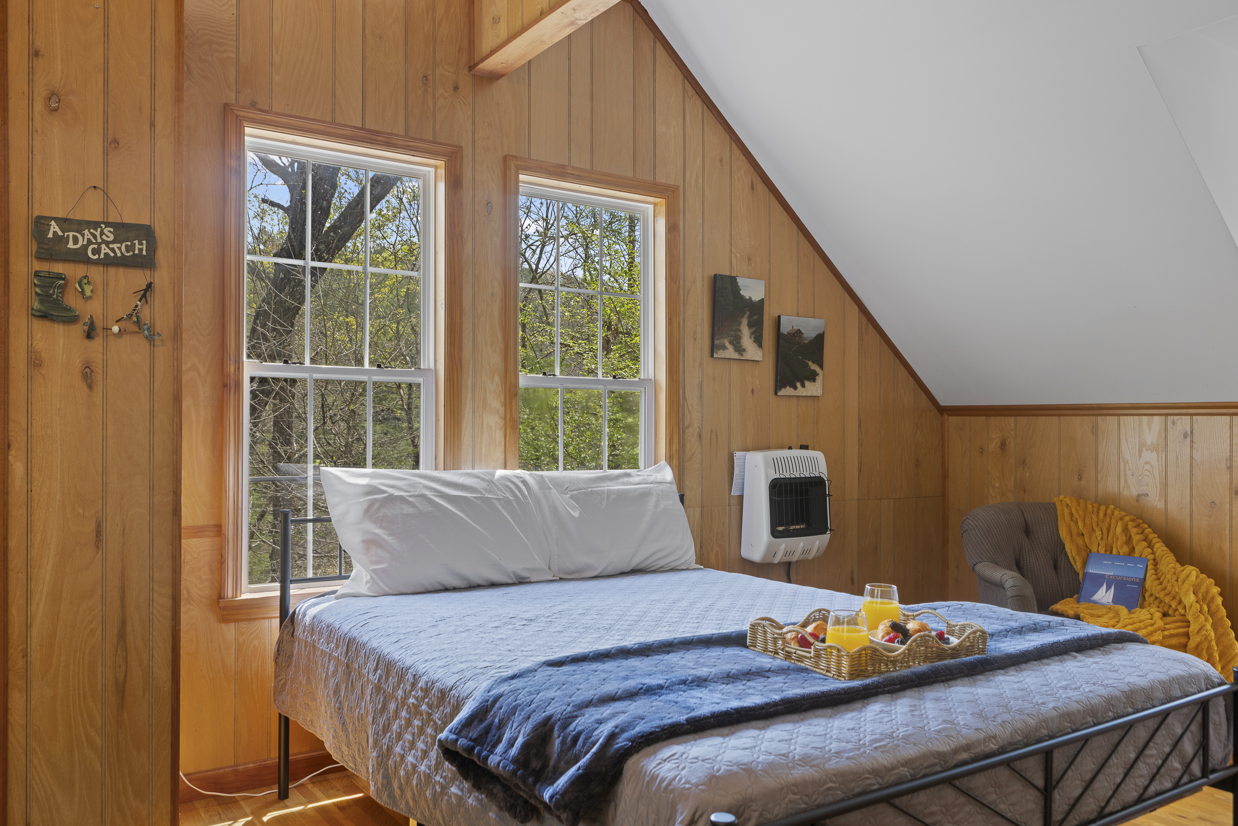 Queen Bedroom 3: Bright space with lovely views, plush seating, and delightful decor awaits you!