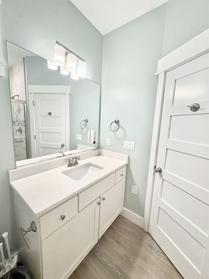 Full bathroom accessible from living area and Bedroom 2