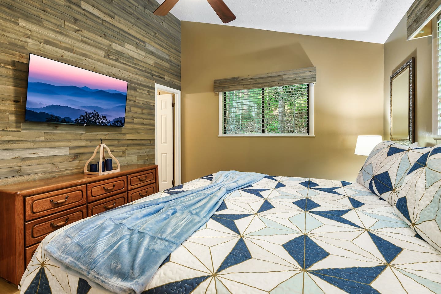 Four of 5 total bedrooms pictured, with Roku streaming TV.