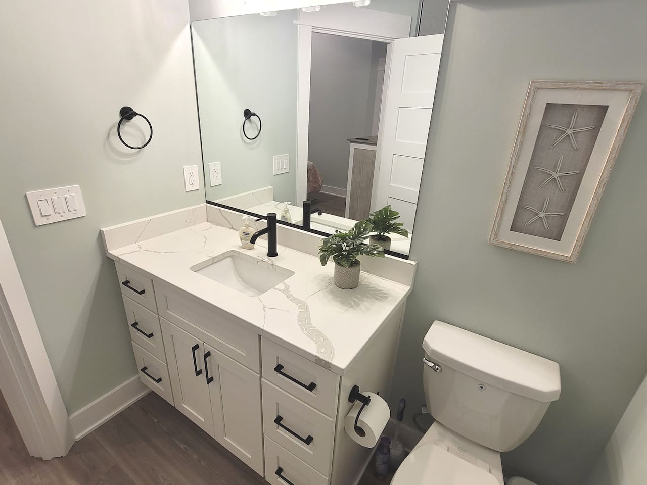 Bright master bathroom.
