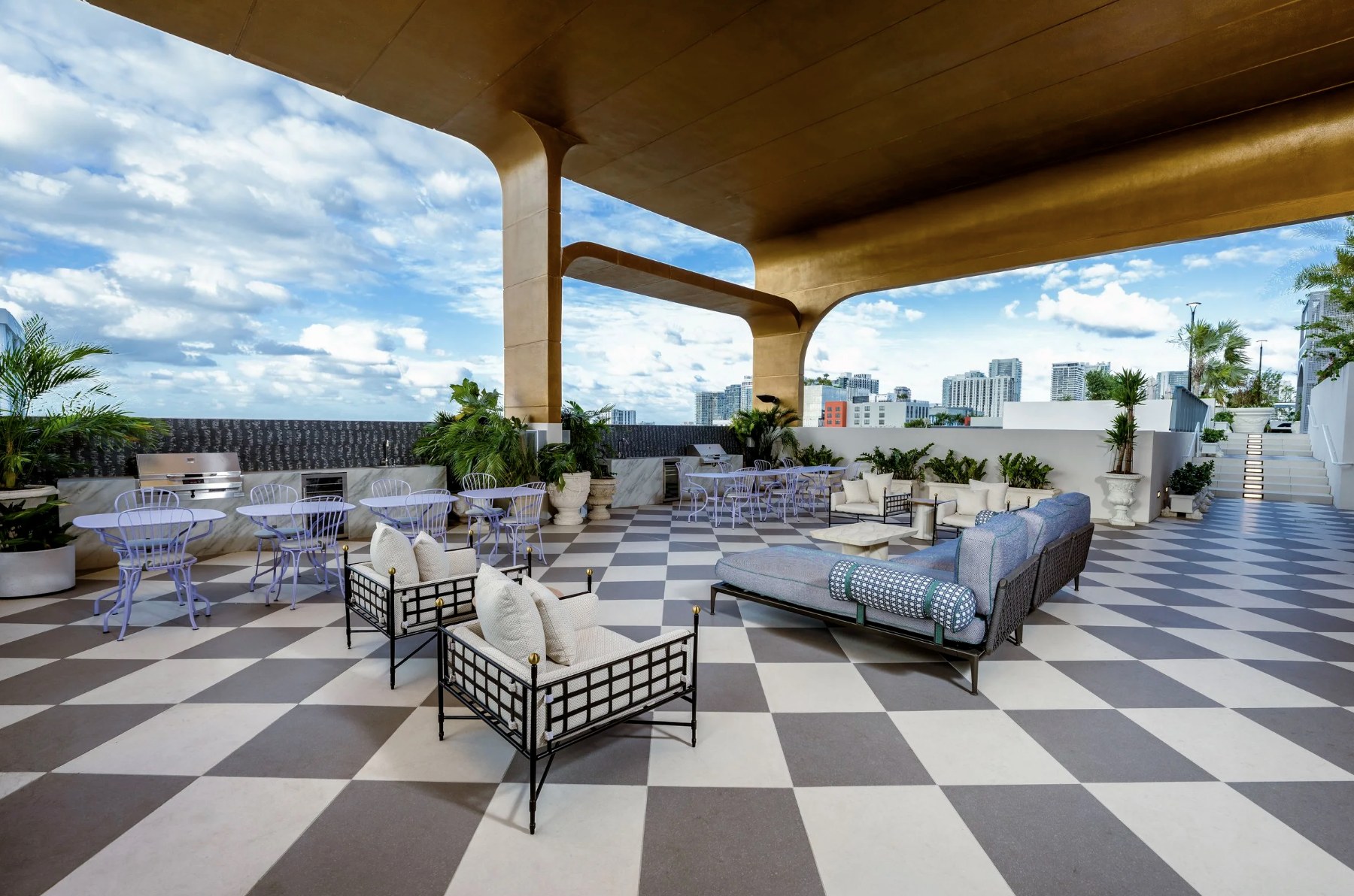 Covered rooftop patio — outdoor lounge seating under sculptural canopy