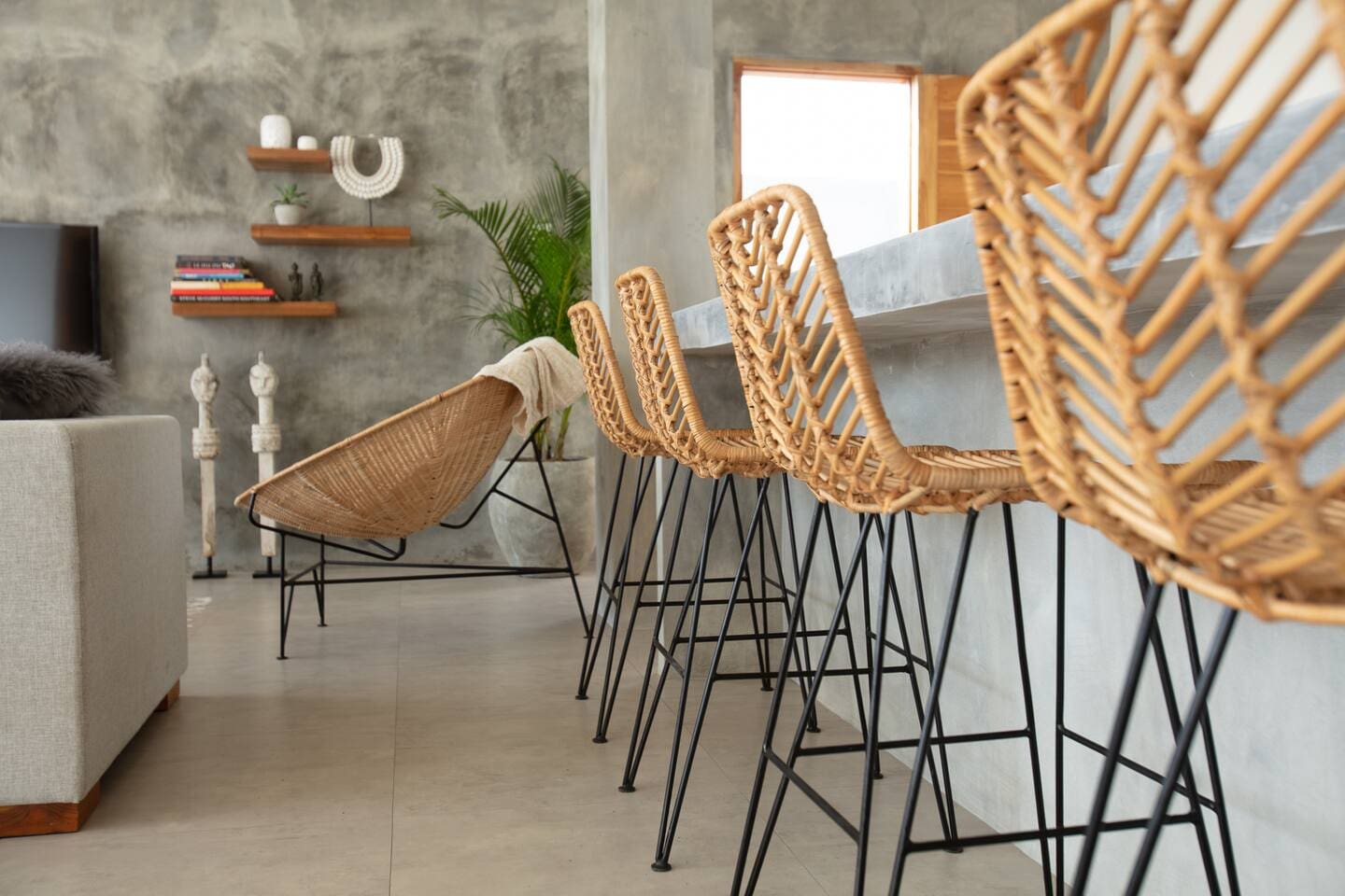 Four people can gather around the counter, whether to enjoy a meal or simply keep company with those cooking.