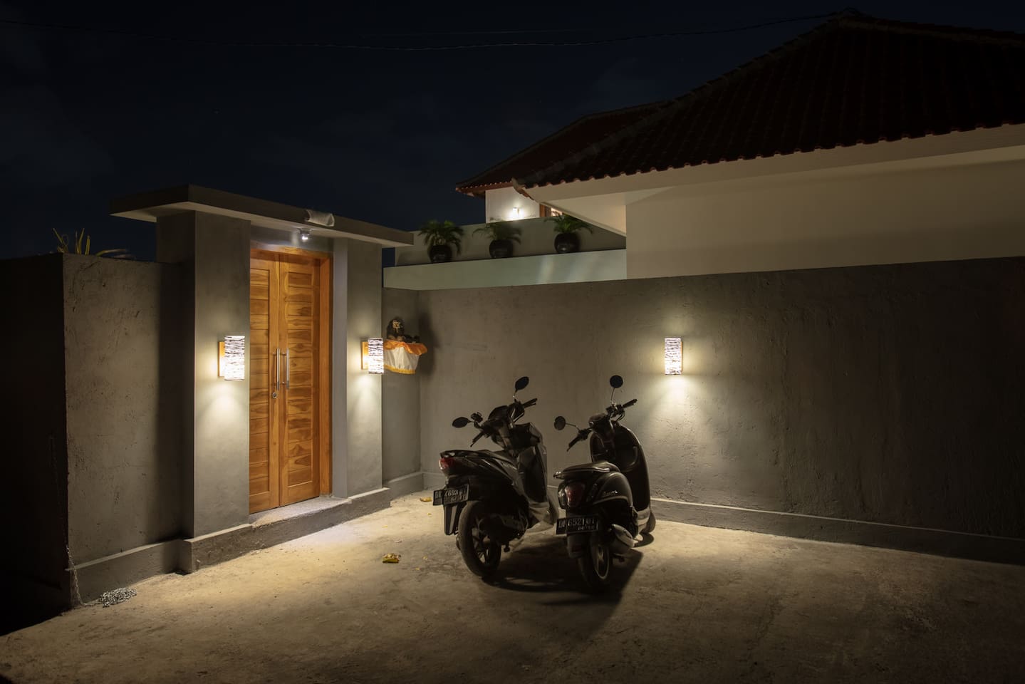 Evening calm: guests’ scooters parked and ready for tomorrow’s adventures.