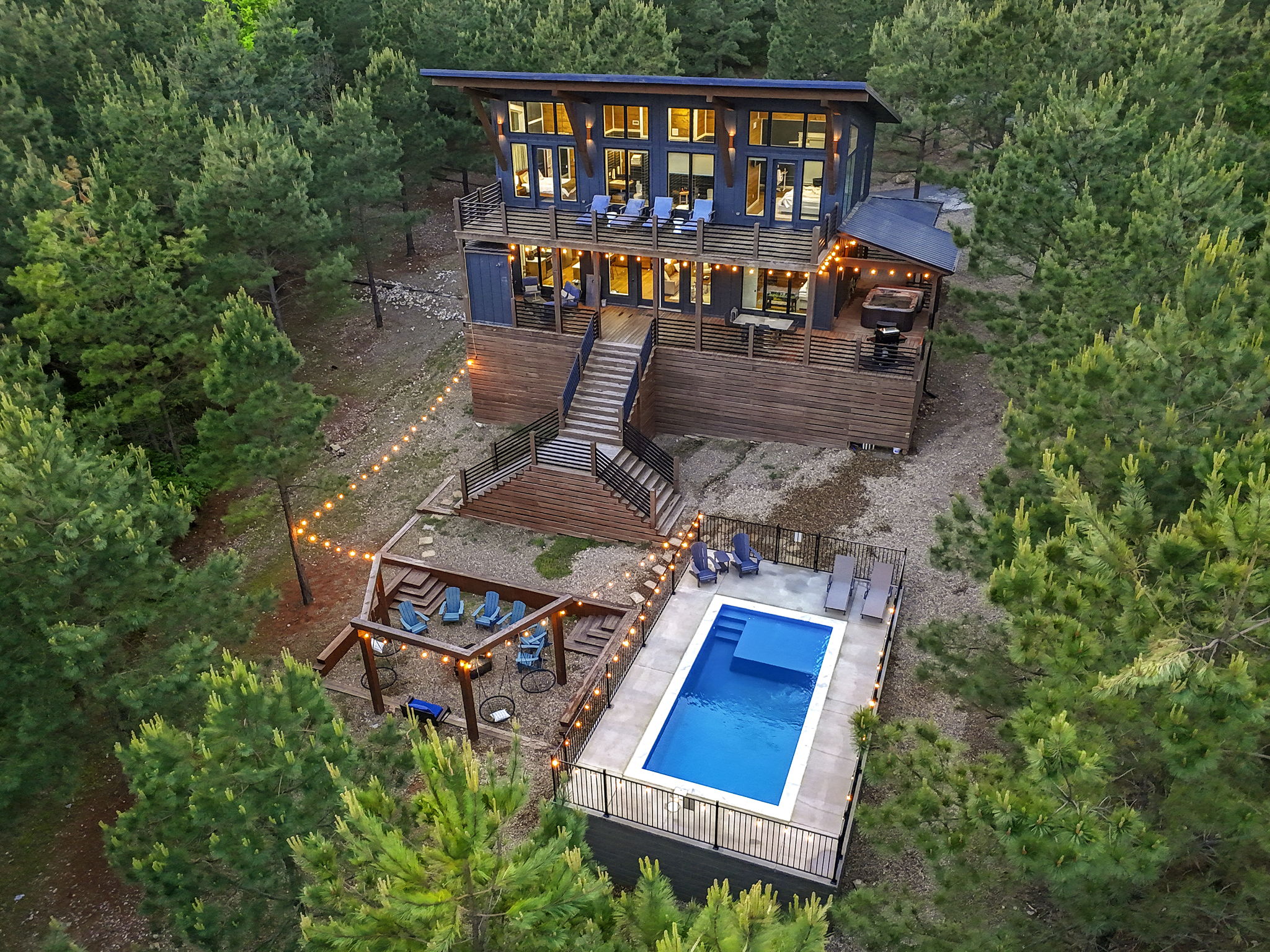 Luxury Broken Bow cabin with private pool, hot tub, fire pit, and panoramic forest views—your ultimate Woodland Oasis getaway in Hochatown.