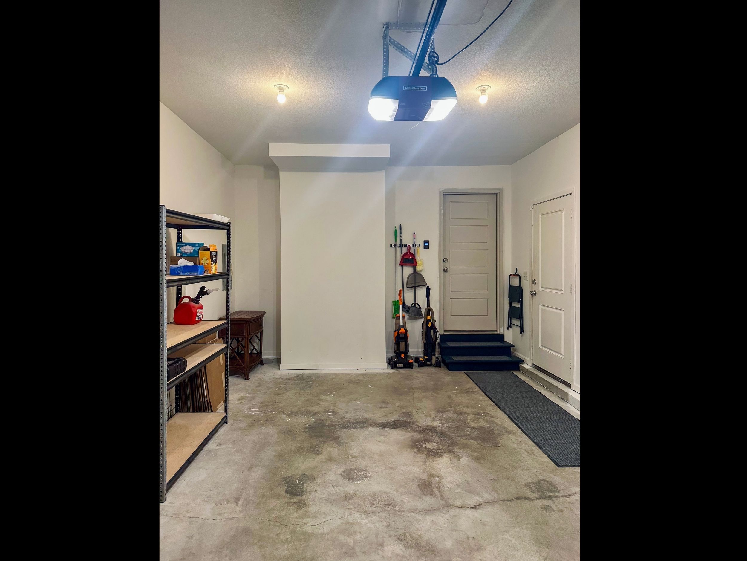 Attached garage offering clean, well-lit space with direct access to the home for added convenience and everyday ease.