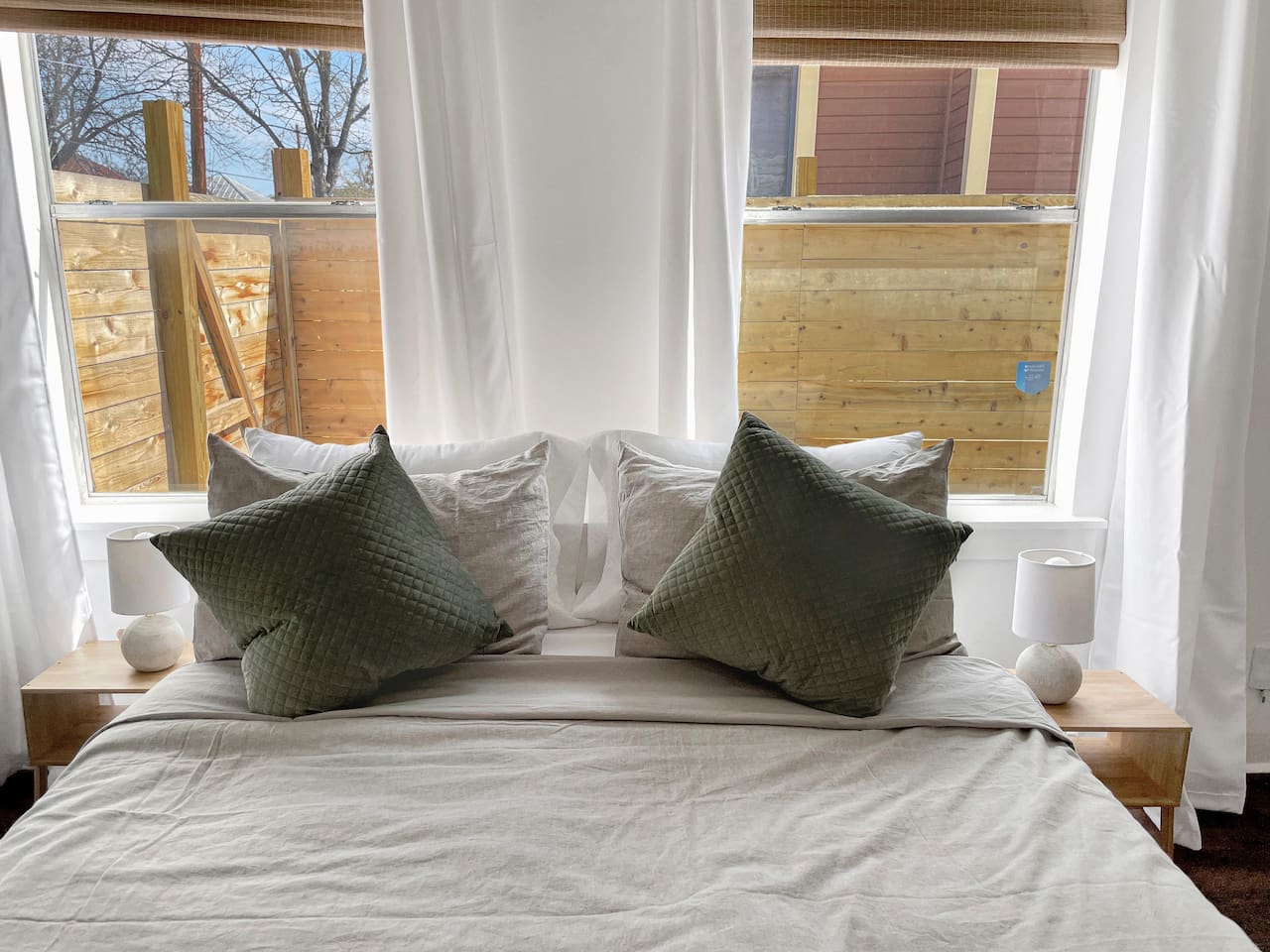 How many pillows are too many? ;-) Close the shades and curtains for total darkness while you sleep.