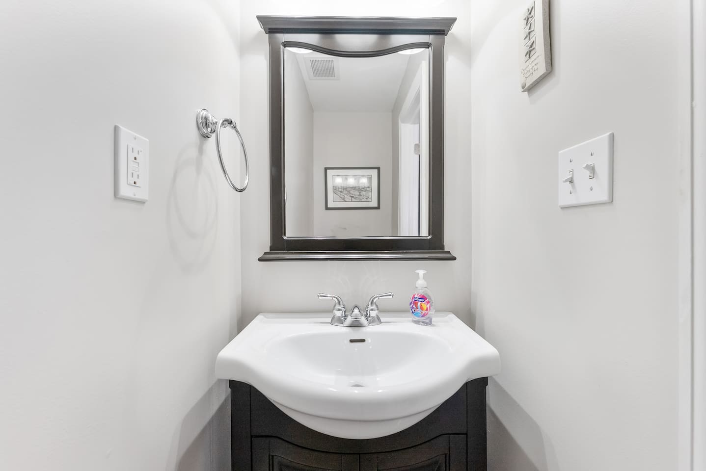 Large half bath with vanity. 