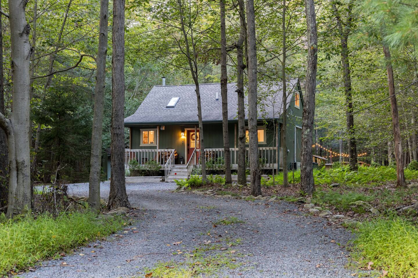 The Pine Cabin is Tucked Back into the Woods