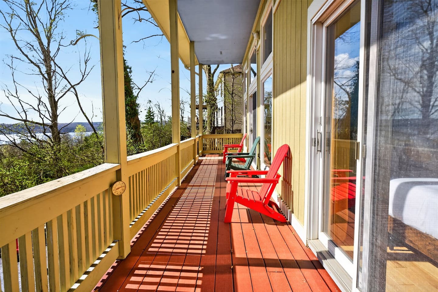 “Start your morning with coffee and end your day with sunset views on this peaceful upstairs balcony—where quiet moments, fresh air, and lake views create memories you won’t forget.”