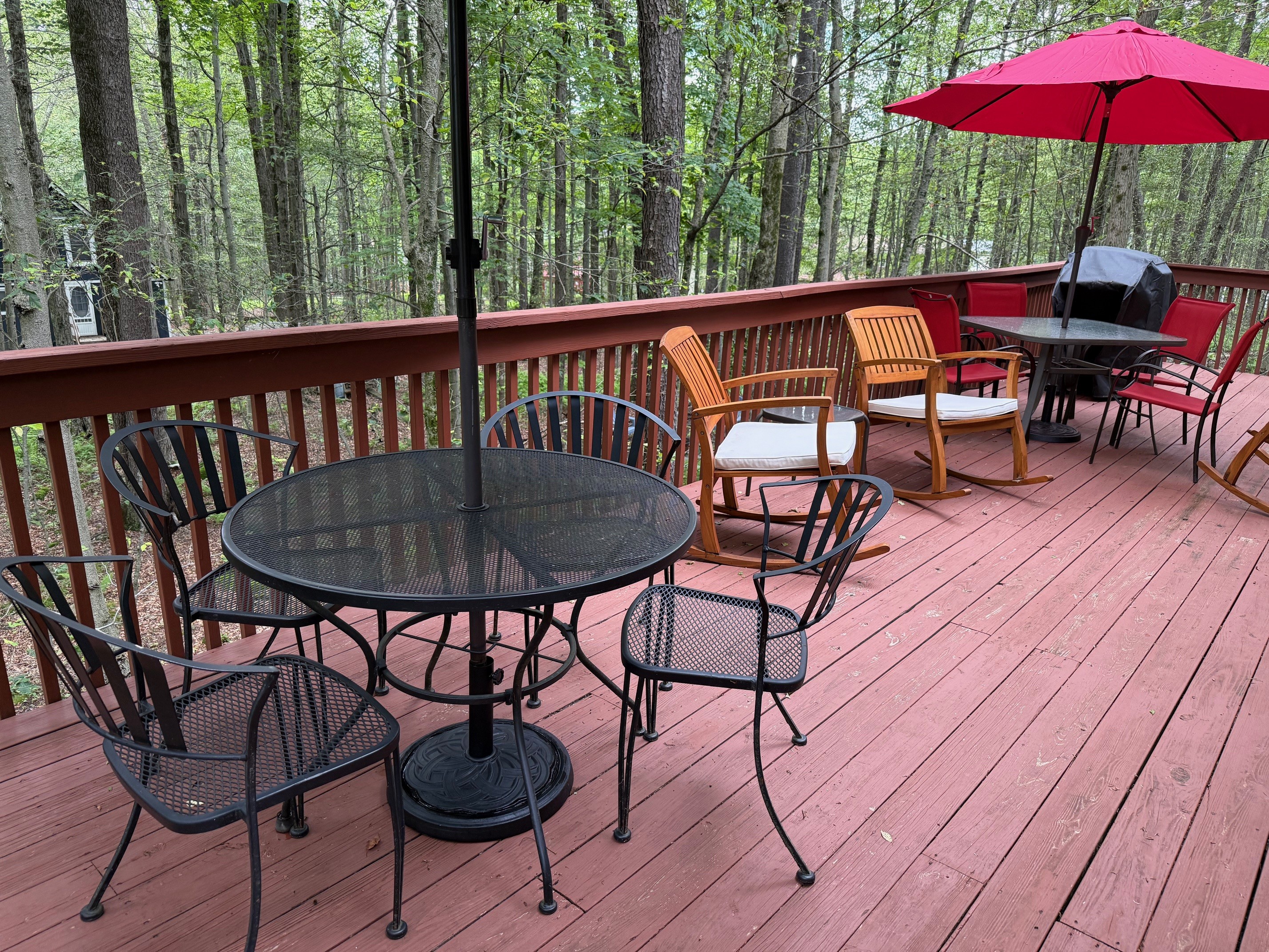 Tables, seating and BBQ on deck