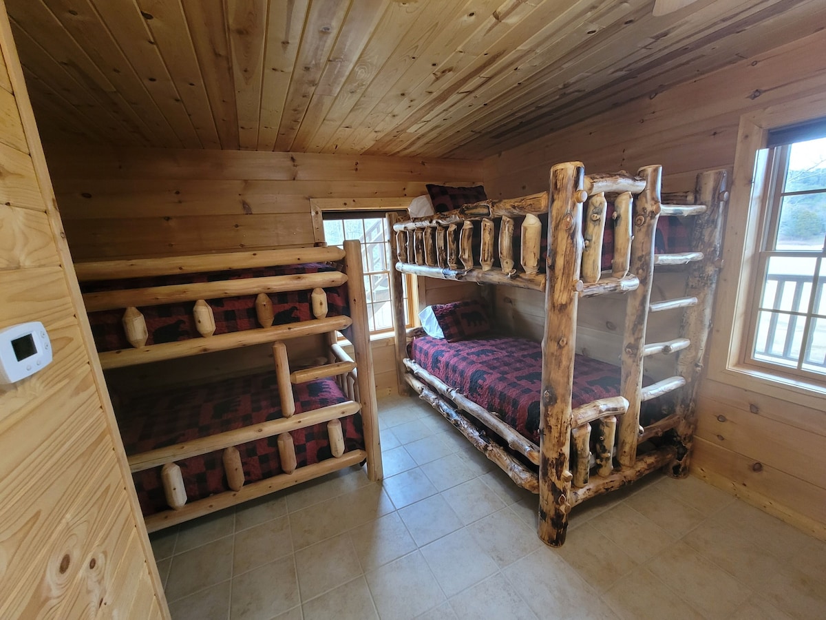 Bedroom #6 on the bottom (basement) floor. 2 twin bunk beds sleeps 4