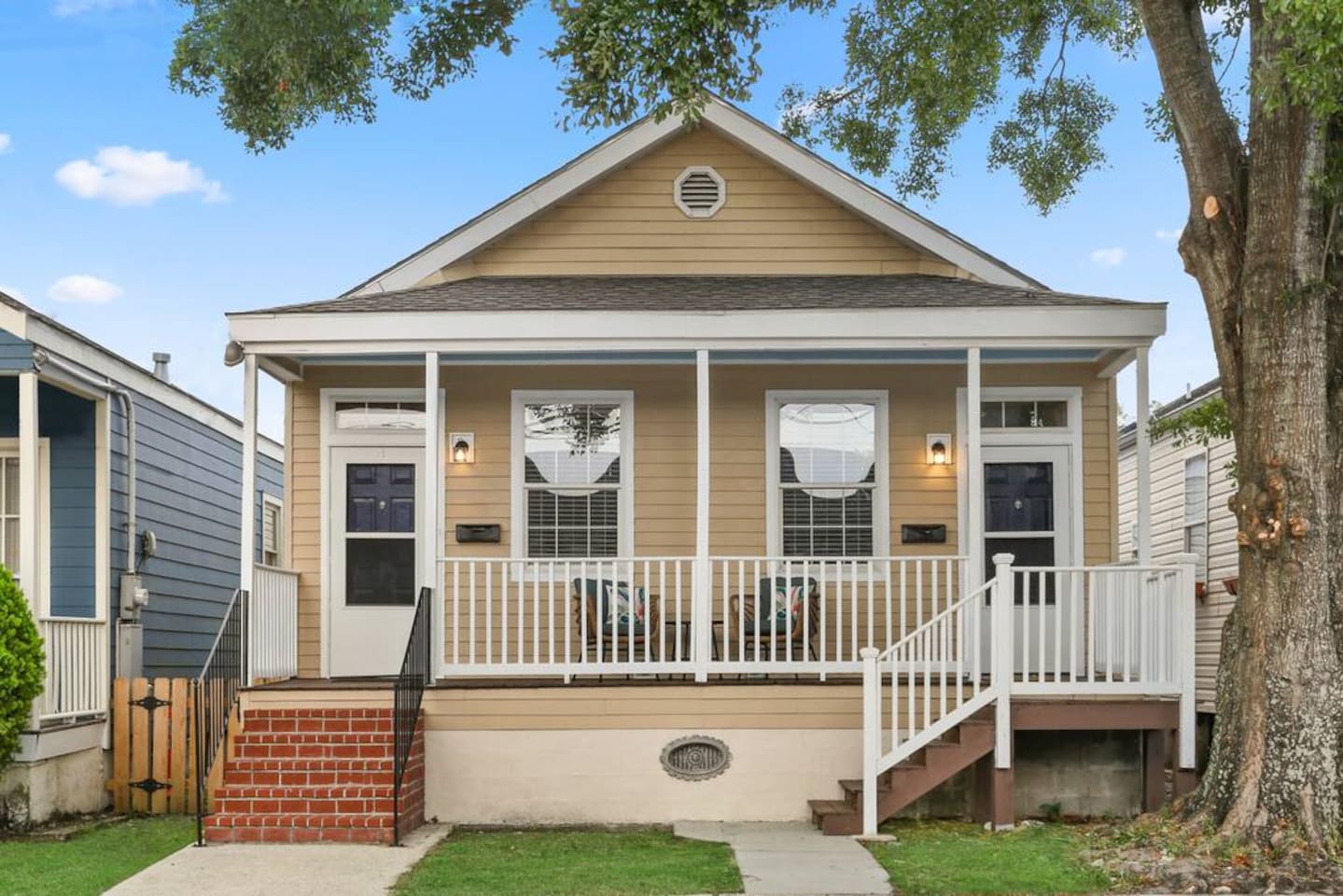 Relax on your shady front porch as you chat with friendly neighbors and sip coffee or wine