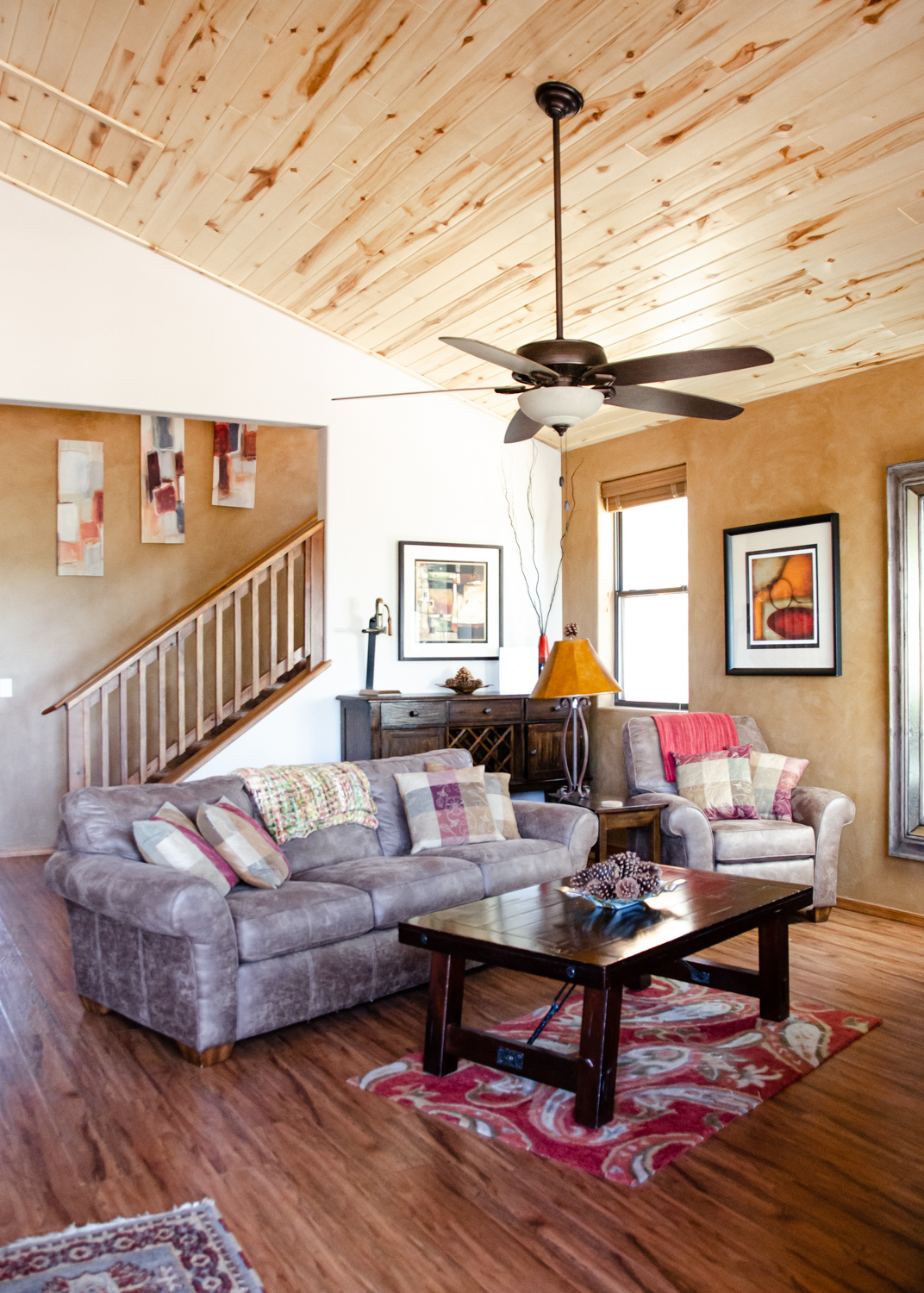 Front room and Stair to the loft and 2nd bedroom