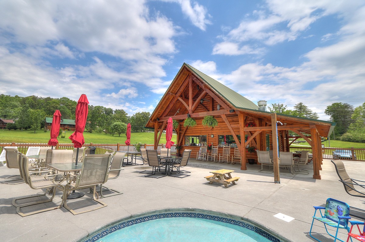 Relax at the community pool complex, featuring a hot tub, patio seating, and on-site deli.  All set against the scenic beauty of Wears Valley.