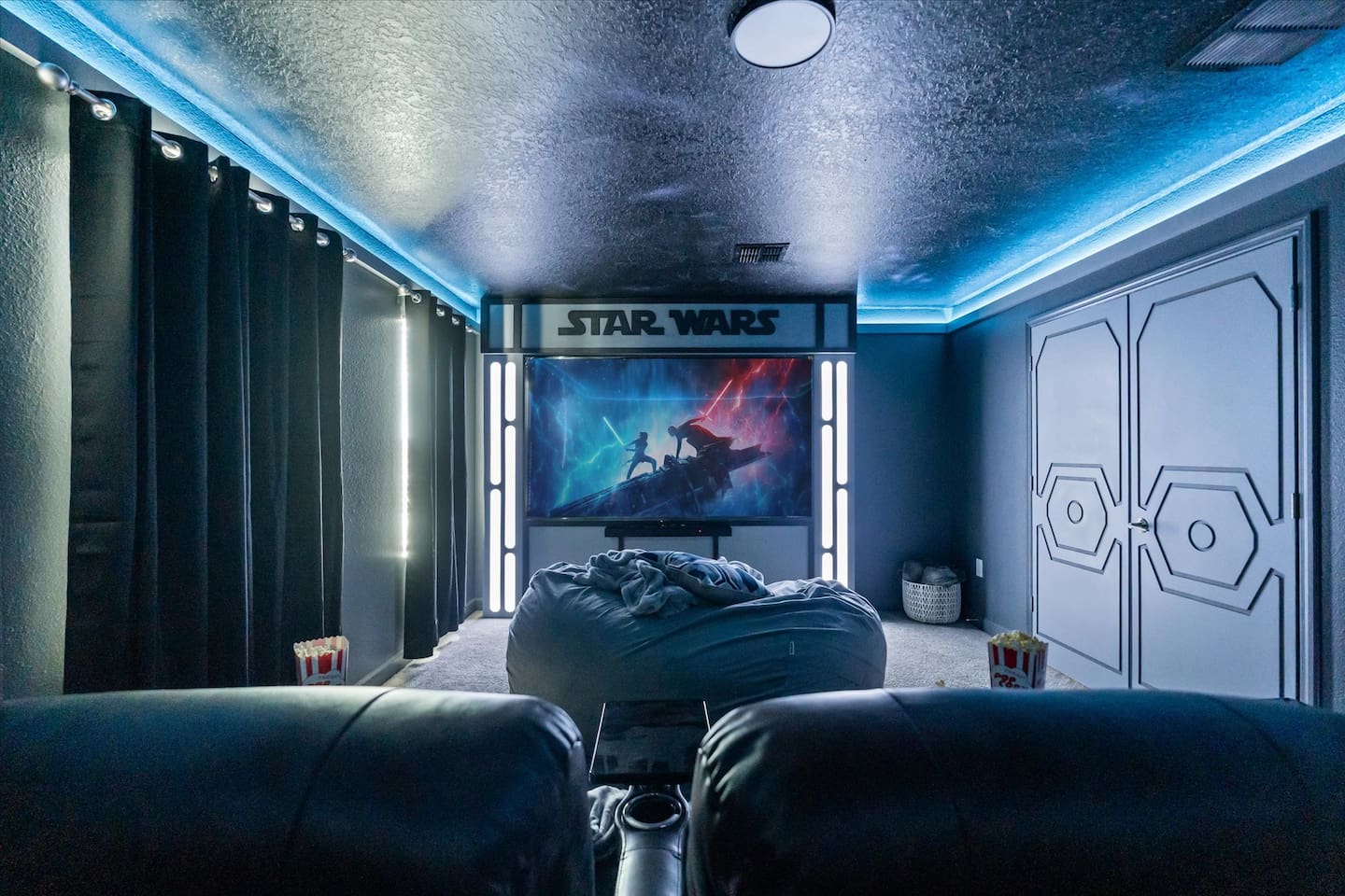 Enjoy a movie in the Star Wars themed theater room on our 98" screen TV.