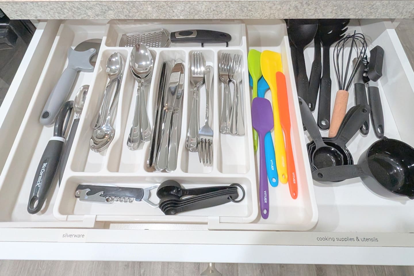 Complete set of silverware and cooking utensils. 