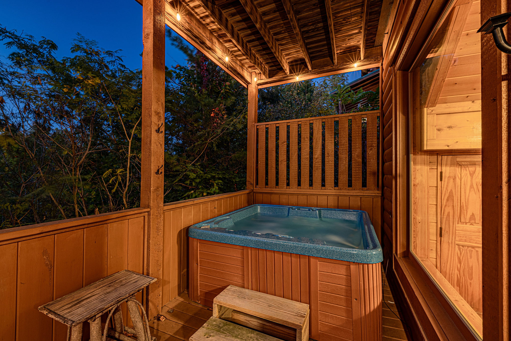 What's better than relaxing in a private hot tub while staying at a cabin in the mountains? The hot tub is located on the lower back deck with privacy screen.