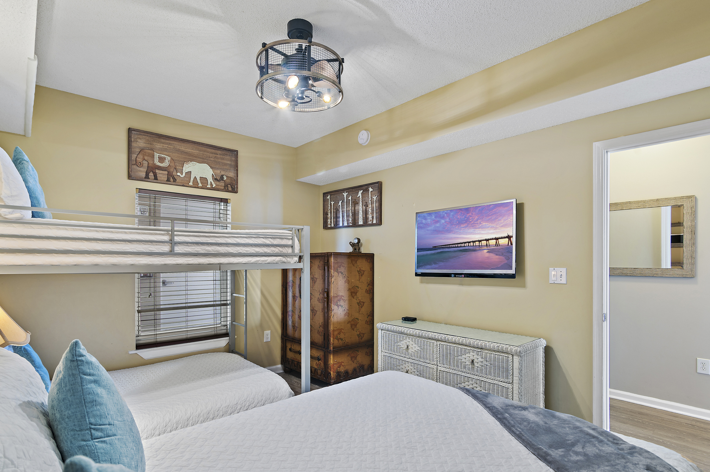 3rd bedroom has QUEEN BED, FULL OVER FULL BUNK BEDS, Smart TV w/ cable, private bathroom, and closet