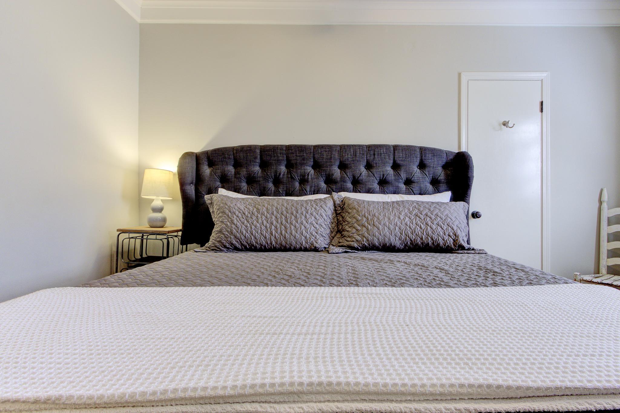 Bedroom #1: King Bed, TV, Jack-and-Jill bathroom shared with Bedroom #2