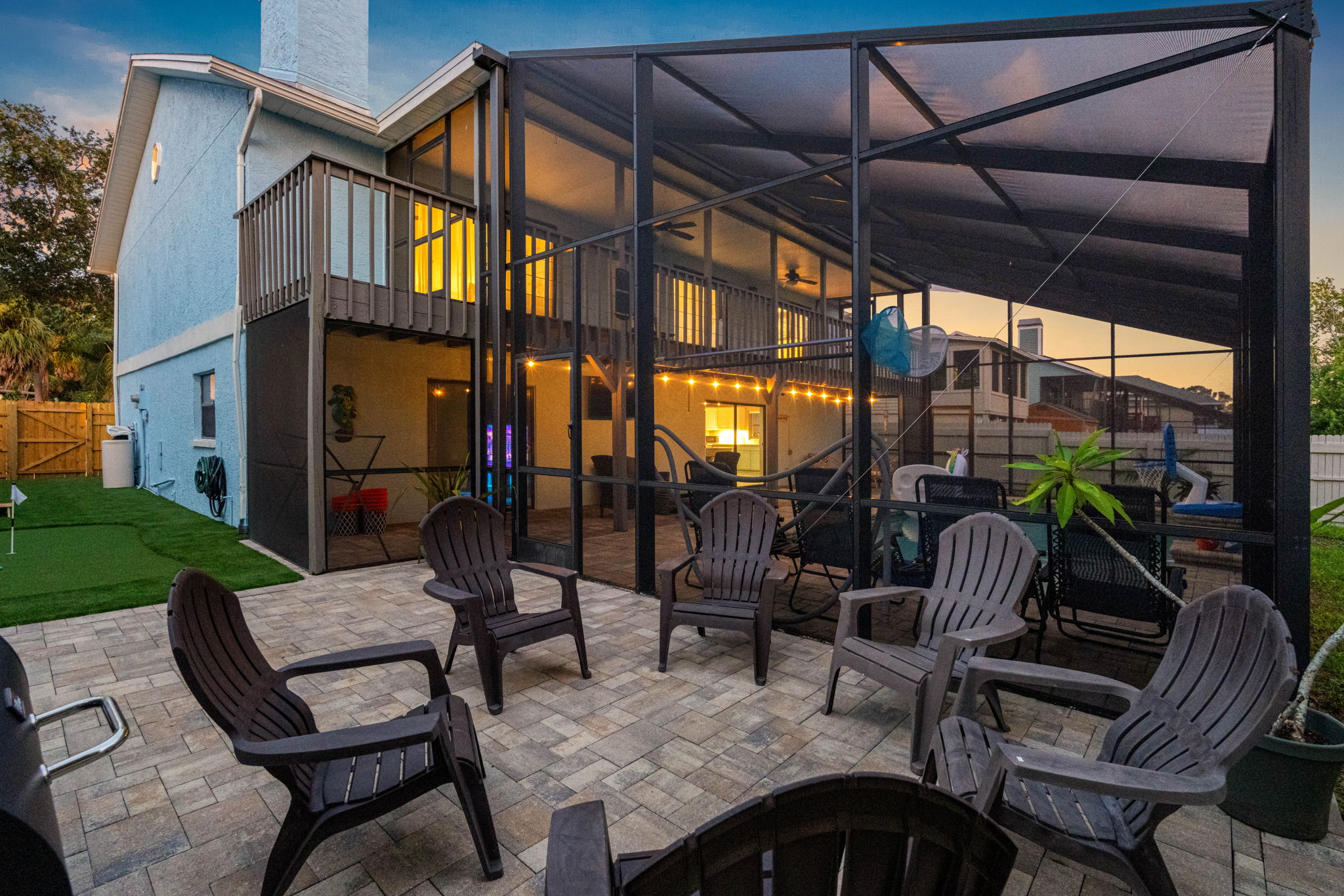 Whether you’re hosting a casual cookout, enjoying the fire, or unwinding poolside, this outdoor space has you covered.