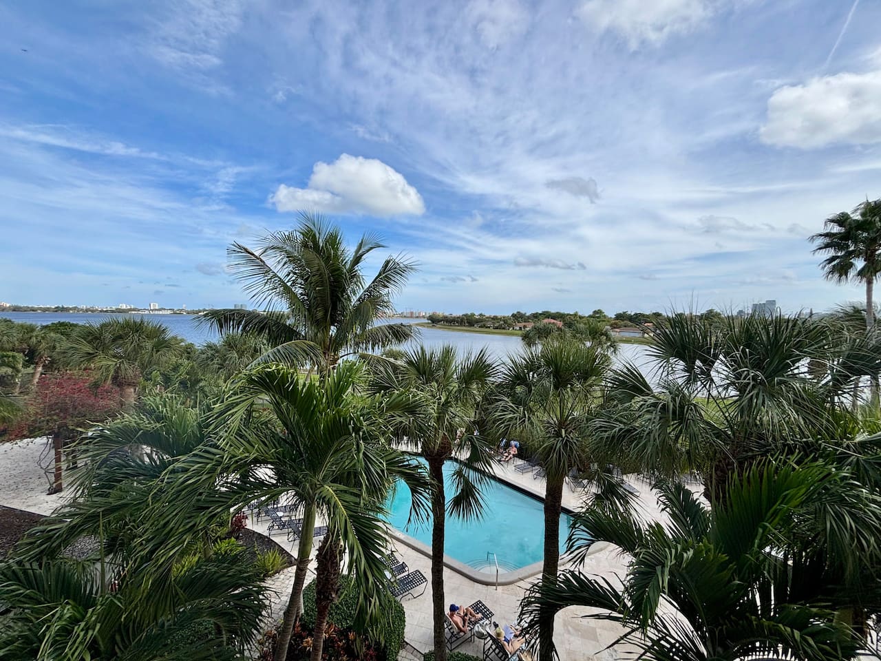 A serene, peaceful view of the pool and lake awaits you.
