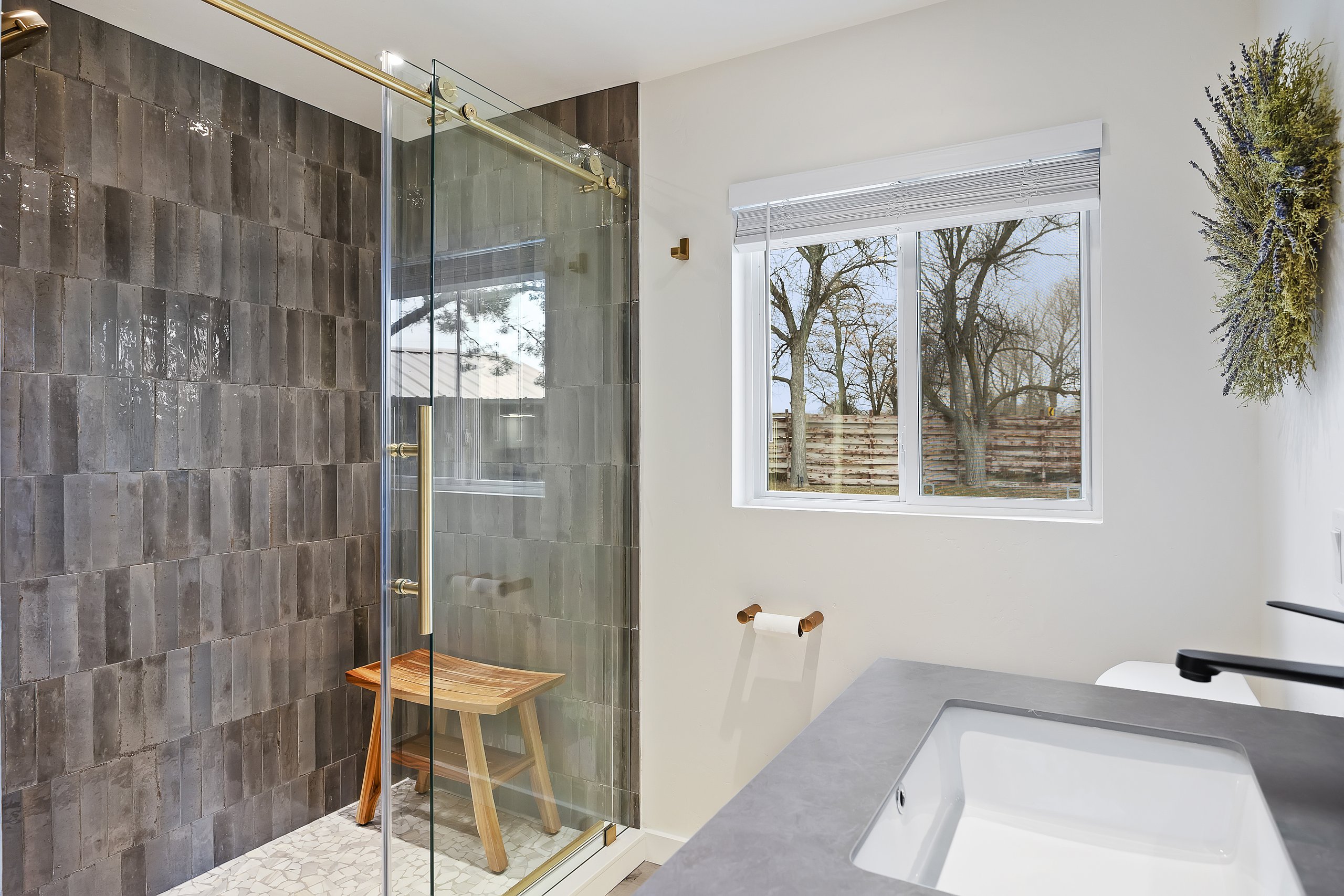 En-suite bath — glass-walled walk-in shower