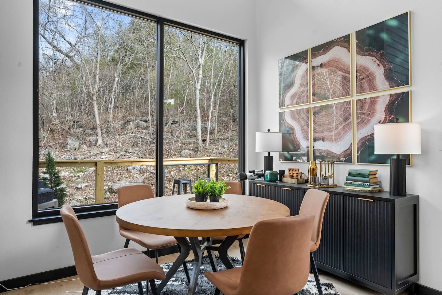 Dining Room: Enjoy meals with nature views and stylish decor in this inviting space!