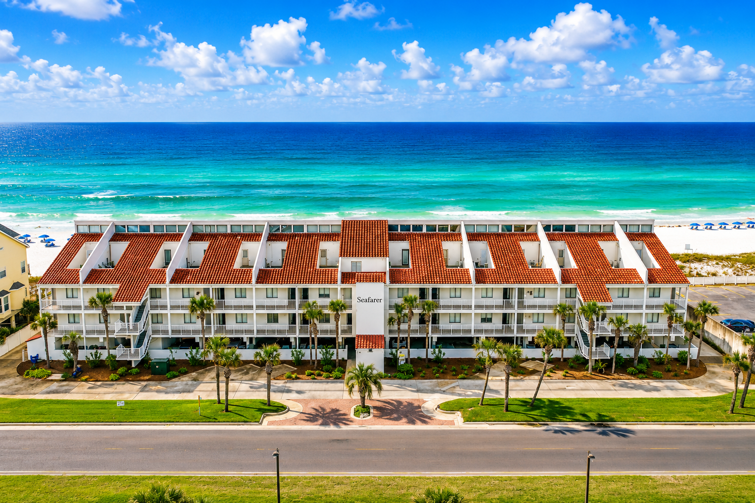Aerial view of the Seafarer beachfront building and its direct access to the Gulf.